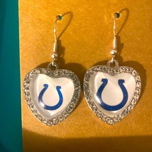 Indianapolis colts white background one horseshoe bigger then other silver tone